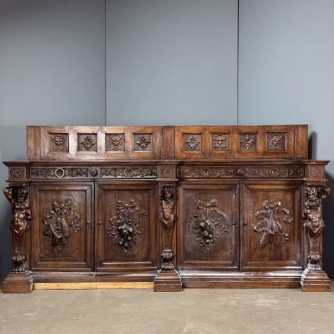 Heavily Carved Sideboard with Figures - RENTAL ONLY