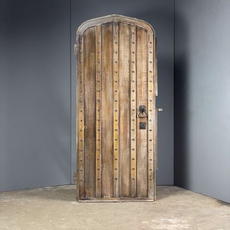 Arched Wooden Door with Studs - RENTAL ONLY